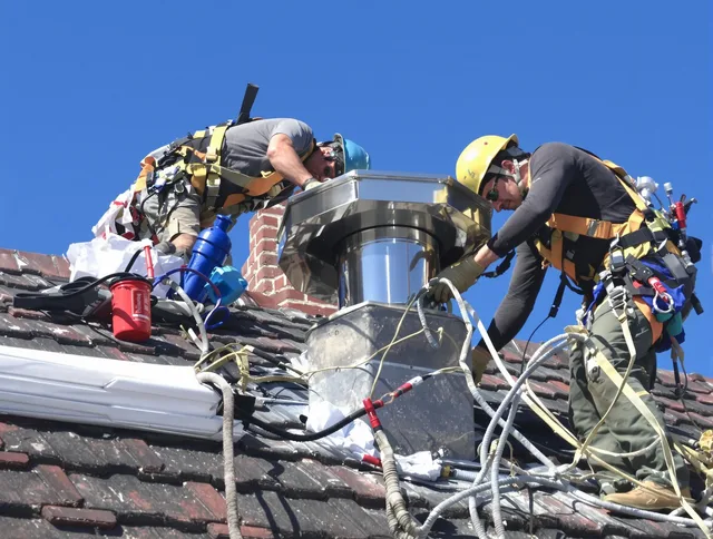 Protective chimney cap installed by Monroe Chimney Sweep in Monroe, NC